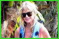 Goldie Hawn Rocks a Red Swimsuit at Age 67, Feeds Dolphins With Kurt Russell